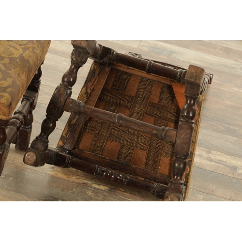 854 - A PAIR OF 17TH CENTURY OAK HALL CHAIRS with scroll-carved top rails above slatted backs, having upho... 