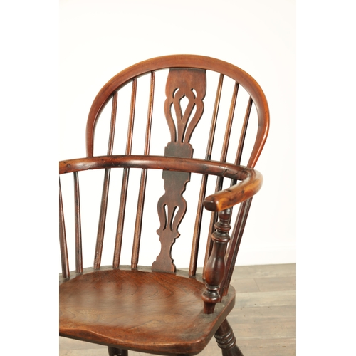 855 - A 19TH CENTURY LOW BACK YEW-WOOD WINDSOR CHAIR with a pierced splat back and elm saddle seat on turn... 