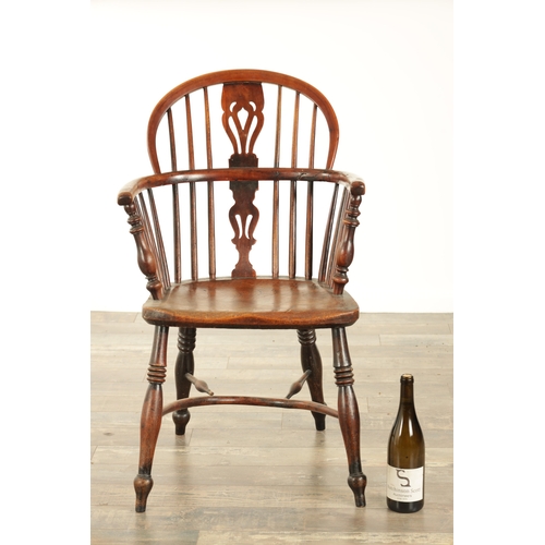 855 - A 19TH CENTURY LOW BACK YEW-WOOD WINDSOR CHAIR with a pierced splat back and elm saddle seat on turn... 