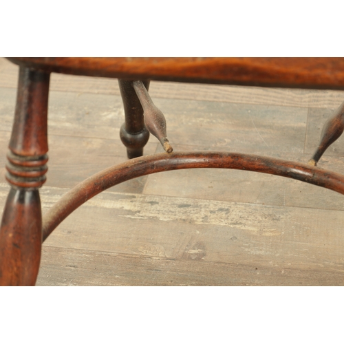 855 - A 19TH CENTURY LOW BACK YEW-WOOD WINDSOR CHAIR with a pierced splat back and elm saddle seat on turn... 