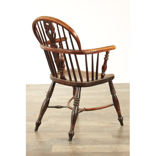 855 - A 19TH CENTURY LOW BACK YEW-WOOD WINDSOR CHAIR with a pierced splat back and elm saddle seat on turn... 