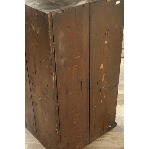 858 - A GOOD EARLY 18TH CENTURY WALNUT HANGING CORNER CUPBOARD with arched panelled door above a single dr... 