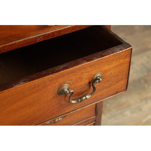 859 - A GEORGE III MAHOGANY CHEST OF DRAWERS with four long graduated drawers fitted with swan-neck handle... 