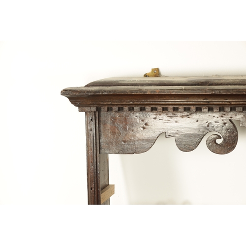 860 - A GEORGE III HANGING OAK DELFT RACK with dentil cornice and scroll-cut frieze centred by a shell abo... 