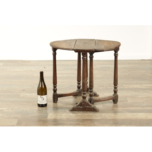 861 - A CHARLES II STYLE MINIATURE OAK DROP LEAF GATE LEG TABLE with turned supports and solid sledge base... 