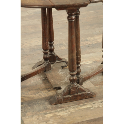 861 - A CHARLES II STYLE MINIATURE OAK DROP LEAF GATE LEG TABLE with turned supports and solid sledge base... 