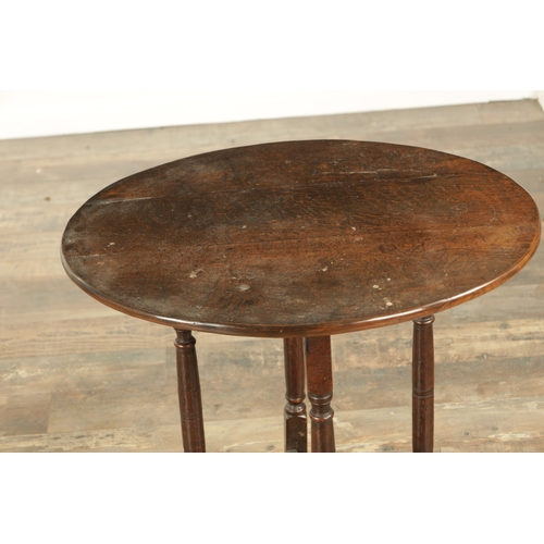 862 - AN EARLY 18TH CENTURY OAK FOLDING TAVERN TABLE with an oval top above a turned folding base (70cm wi... 