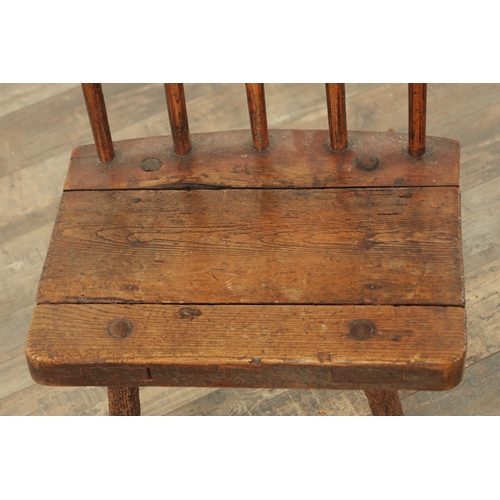 863 - A 19TH CENTURY ELM PRIMITIVE STICK BACK CHAIR with solid seat and square legs (46cm wide 75cm high )