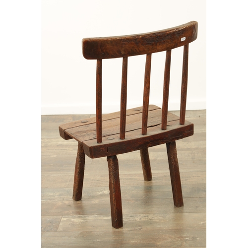 863 - A 19TH CENTURY ELM PRIMITIVE STICK BACK CHAIR with solid seat and square legs (46cm wide 75cm high )