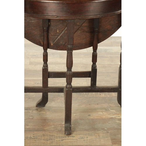 864 - AN EARLY 18TH CENTURY OAK DEMI LUNE SIDE TABLE with fold-down back and hinged top, raised on ring-tu... 