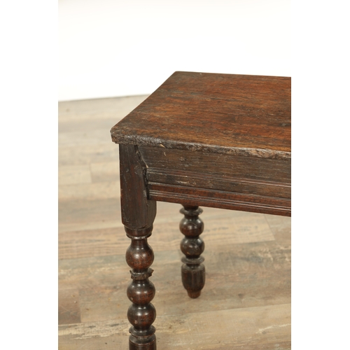 867 - A LATE 17TH CENTURY AND LATER OAK STOOL with plank top raised on ring turned leg supports (52cm wide... 