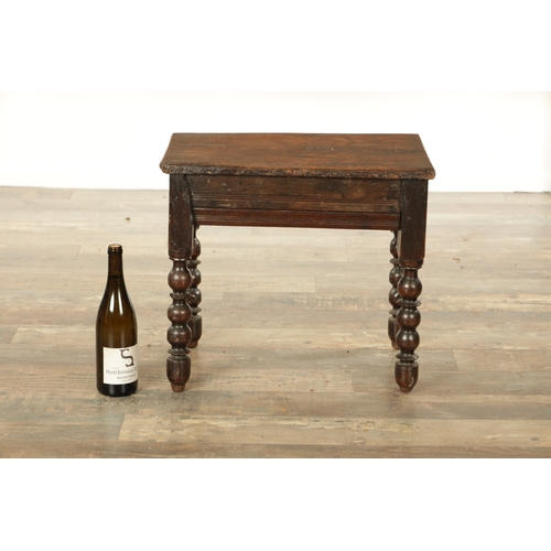 867 - A LATE 17TH CENTURY AND LATER OAK STOOL with plank top raised on ring turned leg supports (52cm wide... 