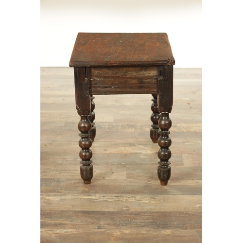 867 - A LATE 17TH CENTURY AND LATER OAK STOOL with plank top raised on ring turned leg supports (52cm wide... 