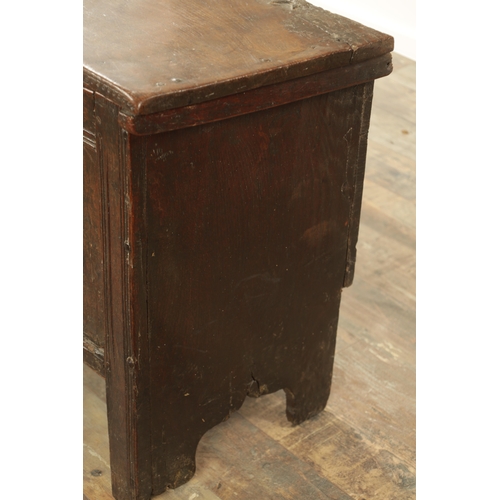 870 - A 17TH CENTURY SMALL NAILED PLANK COFFER the joined double panelled front with moulded borders and c... 