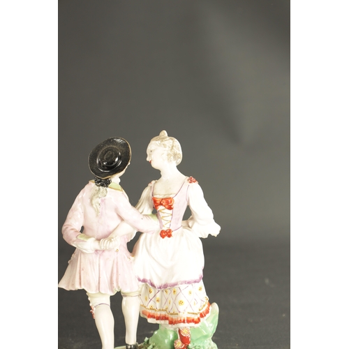 125 - A LATE 18TH CENTURY PAIR OF CHELSEA DERBY PORCELAIN FIGURES CARRYING BASKETS together with a derby d... 