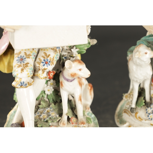 125 - A LATE 18TH CENTURY PAIR OF CHELSEA DERBY PORCELAIN FIGURES CARRYING BASKETS together with a derby d... 