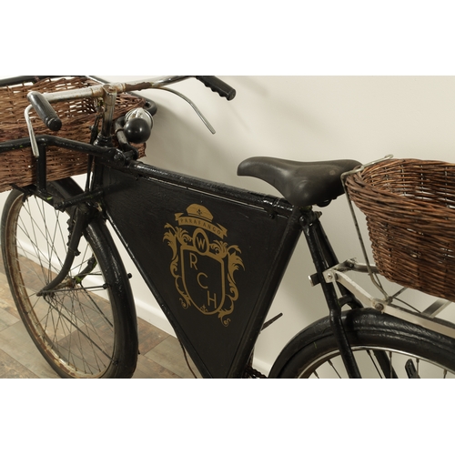 741 - A VINTAGE 1950'S DELIVERY/GROCERY TRADESMAN BICYCLE fitted with baskets to the front and back with a... 