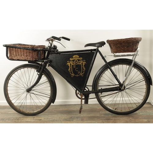 741 - A VINTAGE 1950'S DELIVERY/GROCERY TRADESMAN BICYCLE fitted with baskets to the front and back with a... 