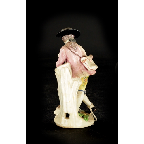 315 - A MID 18TH CENTURY BOW PORCELAIN PIPING SHEPHERD AND DOG (15cm high)