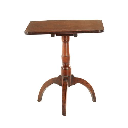 736 - A 19TH CENTURY MINIATURE FRUIT WOOD TILT TOP TABLE with turned stem and splayed tripod legs.