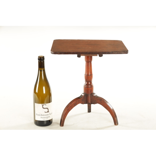 736 - A 19TH CENTURY MINIATURE FRUIT WOOD TILT TOP TABLE with turned stem and splayed tripod legs.