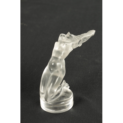 10 - AN R LALIQUE FRANCE CLEAR GLASS ‘CHRYSIS’ CAR MASCOT depicting a reclining nude female on a circular... 