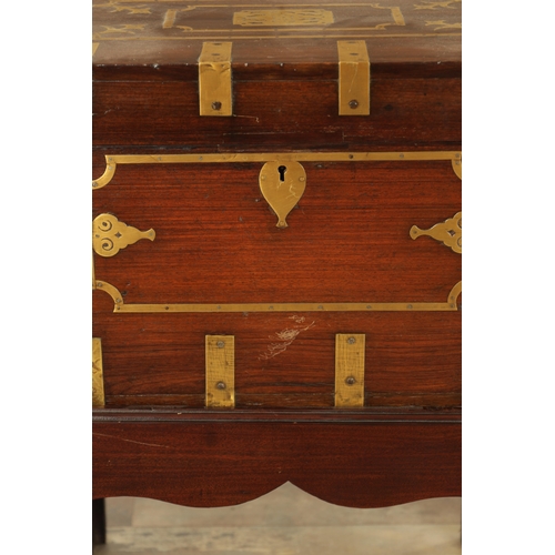 103 - AN 18TH CENTURY INDIAN HARDWOOD AND INLAID BRASS DRESSING BOX ON STAND with hinged top revealing a f... 