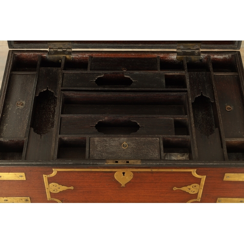 103 - AN 18TH CENTURY INDIAN HARDWOOD AND INLAID BRASS DRESSING BOX ON STAND with hinged top revealing a f... 