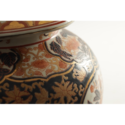 109 - A PAIR OF 19TH CENTURY STYLE IMARI VASES AND COVERS with polychrome coloured decoration and gilt hig... 