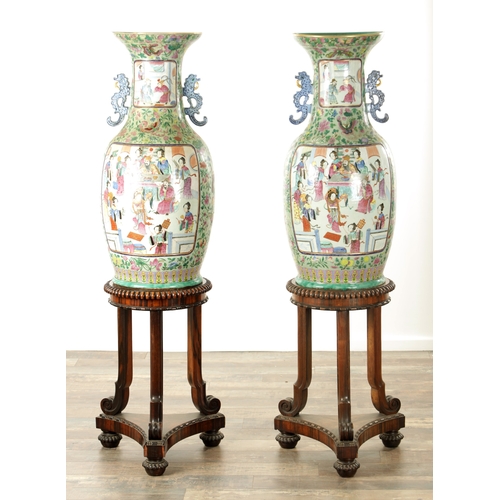 120 - AN IMPRESSIVE PAIR OF 19TH CENTURY CANTONESE CELADON GROUND AND FAMILLE ROSE HALL VASES ON LATE REGE... 