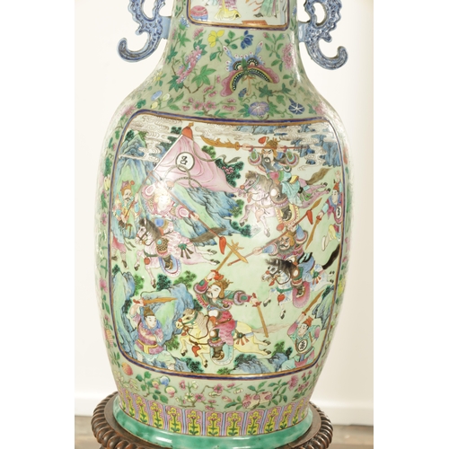 120 - AN IMPRESSIVE PAIR OF 19TH CENTURY CANTONESE CELADON GROUND AND FAMILLE ROSE HALL VASES ON LATE REGE... 