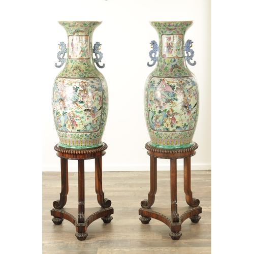 120 - AN IMPRESSIVE PAIR OF 19TH CENTURY CANTONESE CELADON GROUND AND FAMILLE ROSE HALL VASES ON LATE REGE... 