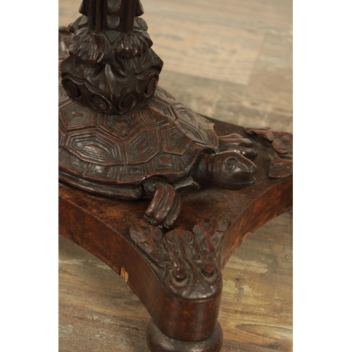 123 - A 19TH CENTURY CARVED HARDWOOD ANGLO INDIAN OCCASIONAL TABLE with a geometric carved top above a lea... 