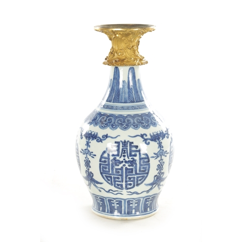 125 - AN 18TH CENTURY CHINESE BLUE AND WHITE BULBOUS VASE WITH CAST ORMOLU NECK MOUNT decorated with circu... 