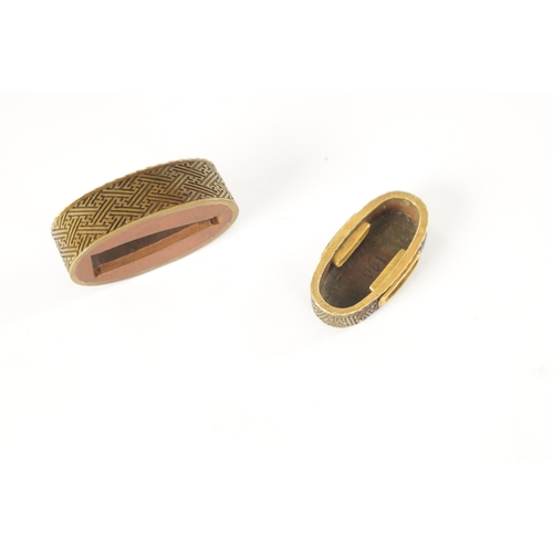 141 - A FINE EDO PERIOD JAPANESE MIXED METAL AND BRONZE FUCHI KASHIRA having geometric designs (4cm wide )