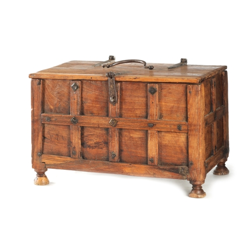 151 - AN 18TH CENTURY FRUITWOOD IRON MOUNTED INDIAN CASKET with strap hinges and panelled front; raised on... 