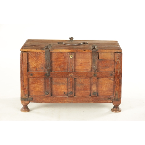 151 - AN 18TH CENTURY FRUITWOOD IRON MOUNTED INDIAN CASKET with strap hinges and panelled front; raised on... 