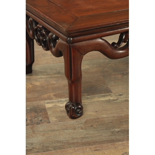 155 - A 19TH CENTURY CHINESE HARDWOOD ALTAR TABLE with panelled top above a openwork carved base and short... 