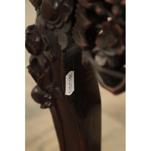 159 - A 19TH CENTURY HARDWOOD CHINESE JARDINIERE STAND with shaped inset marble top above a pierced leaf c... 