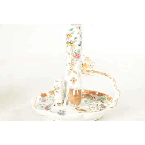 174 - A LATE 18TH CENTURY CHINESE PORCELAIN FAMILLE ROSE CANDLESTICK modelled as a bamboo shoot with drago... 