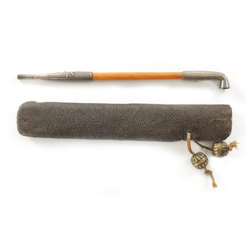 179 - A JAPANESE MEIJI PERIOD OPIUM PIPE AND CASE, the pipe having planished silvered metal mounts with fl... 