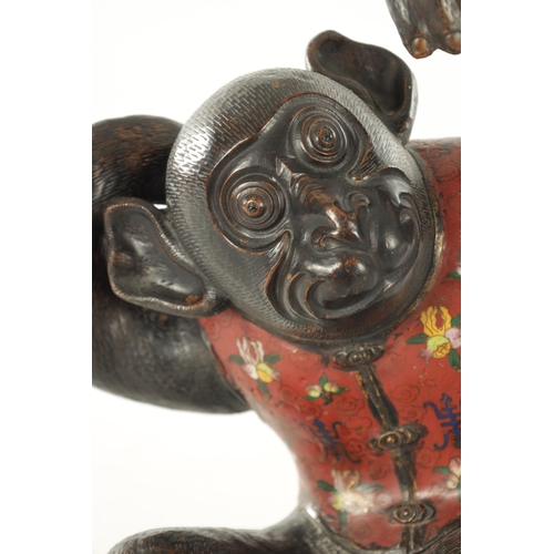 185 - A 19TH CENTURY CHINESE BRONZE AND CLOISONNE SCULPTURE OF A MONKEY with floral inlaid enamel body (38... 