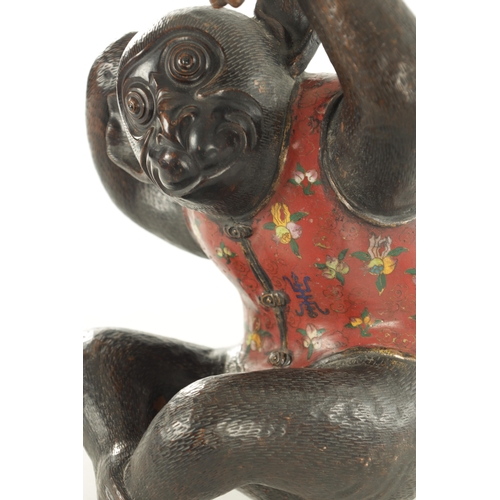 185 - A 19TH CENTURY CHINESE BRONZE AND CLOISONNE SCULPTURE OF A MONKEY with floral inlaid enamel body (38... 