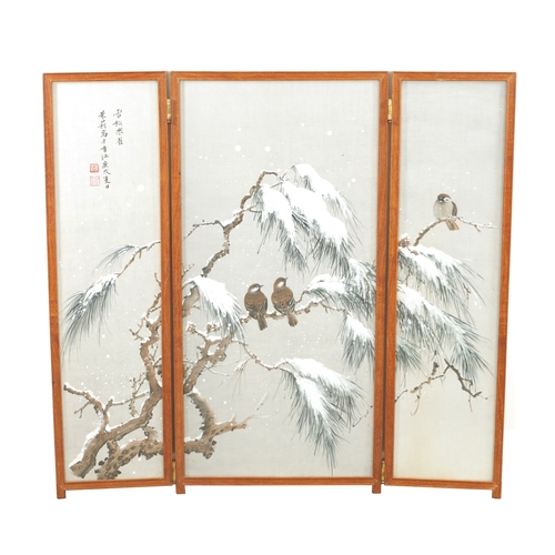 188 - A JAPANESE MEIJI PERIOD THREE-FOLD WATERCOLOUR FRAMED SCREEN depicting birds perched in winter pine ... 