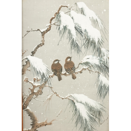 188 - A JAPANESE MEIJI PERIOD THREE-FOLD WATERCOLOUR FRAMED SCREEN depicting birds perched in winter pine ... 