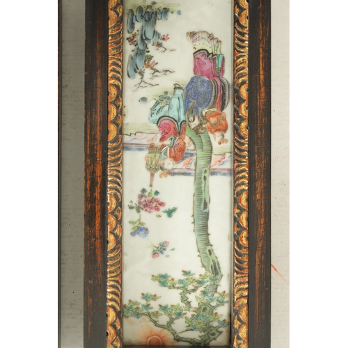 191 - A PAIR OF 19TH CENTURY CANTONESE FAMILLE ROSE HANGING PLAQUES painted in enamel colours with interio... 