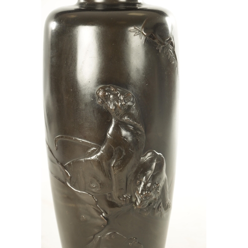 196 - A LARGE MEIJI PERIOD JAPANESE PATINATED BRONZE VASE, the body decorated with two tigers in relief, i... 