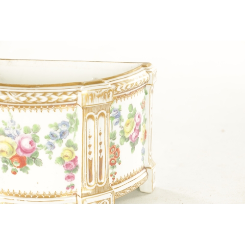 31 - A LATE 18TH CENTURY PARIS PORCELAIN BOUGH POT decorated with flowering swagwork within gilded border... 