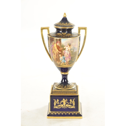 32 - A 19TH CENTURY VIENNA PORCELAIN TWO HANDLED LIDDED URN SHAPED VASE ON PEDESTAL the richly gilded roy... 