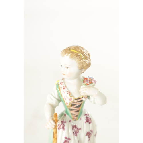 40 - A 19TH CENTURY MEISSEN PORCELAIN FIGURE OF A YOUNG GIRL in a standing pose holding a flower spray an... 